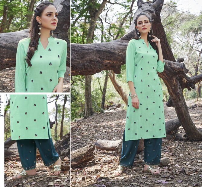 Tunic House Nirvi Fancy Ethnic Wear Rayon Kurti With Bottom Collection